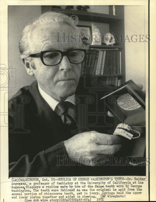 1971 Reidar Sognnaes shows replica of Washington's false teeth - Historic Images