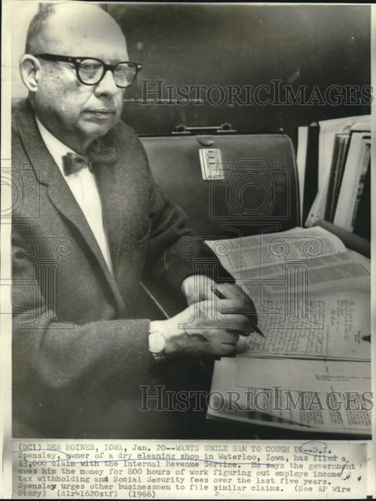 1966 D.J. Spensley, owner of a dry cleaning shop in Waterloo, Iowa - Historic Images