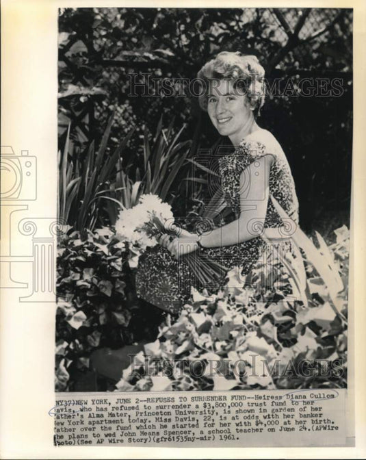 1961 Heiress Diana Cullom Davis in New York apartment garden - Historic Images