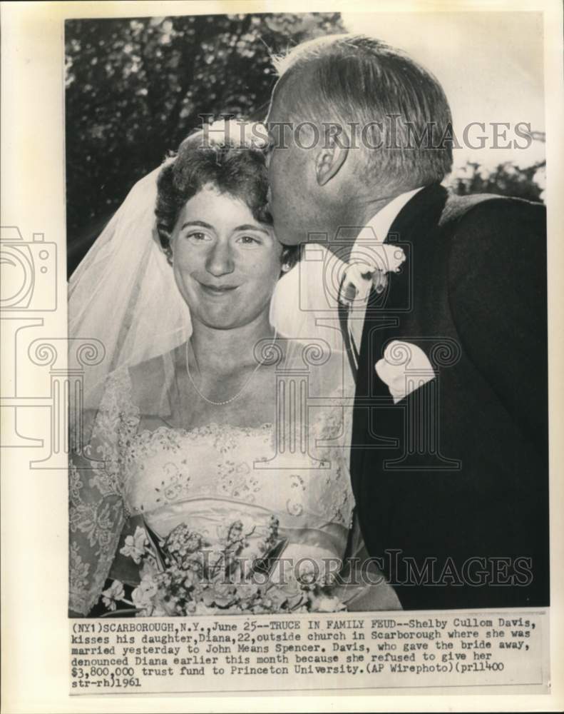 1961 Shelby Cullom Davis kisses daughter outside Scarborough church. - Historic Images