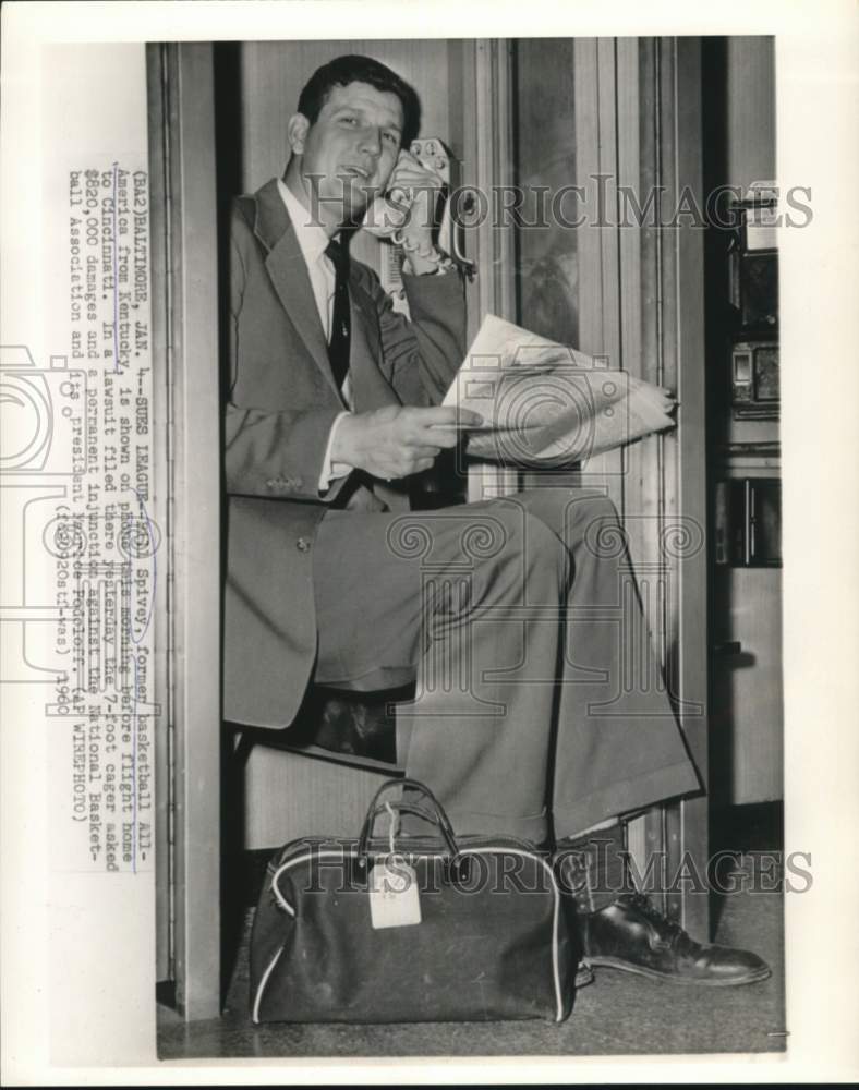 1960 Press Photo Former basketball All-American speaks on phone at Baltimore, MD- Historic Images