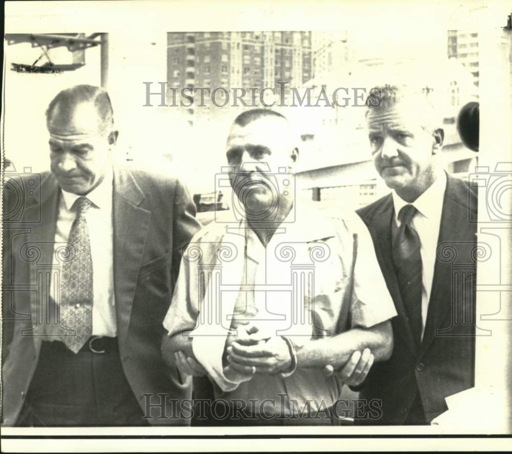 1972 Frank Markoe Sibley enters Federal Court in Seattle - Historic Images