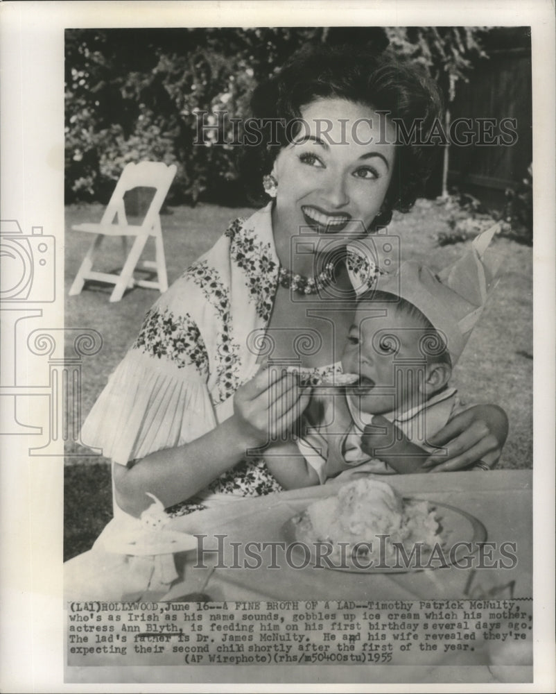 1955 Actress Ann Blyth feeding her son, Timothy Patrick McNulty-Historic Images