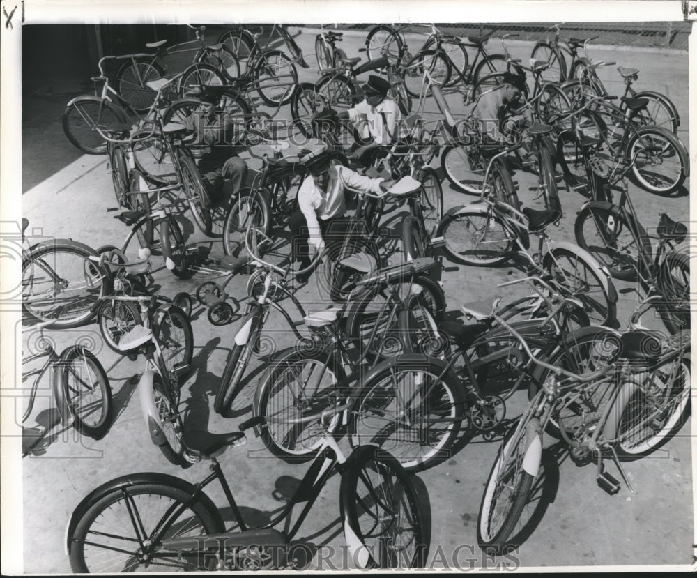 1956 Press Photo Firefighters and Captain Prepare Kids&#39; Bikes - nox06658- Historic Images