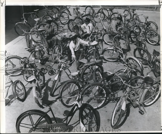 1956 Press Photo Firefighters and Captain Prepare Kids' Bikes - nox06658- Historic Images
