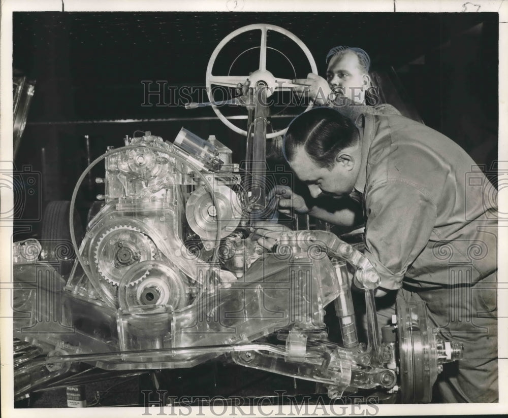 1953 Press Photo Engine Checked by Engineers in New World in Engineering Show-Historic Images