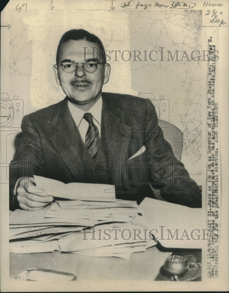 1948 Press Photo New York State Governor Thomas E. Dewey with pile on Desk-Historic Images