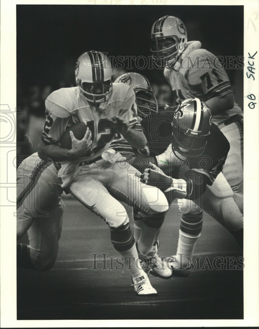 1978 Miami Dolphins' Football Player Bob Griese sacked by Saints - Historic Images