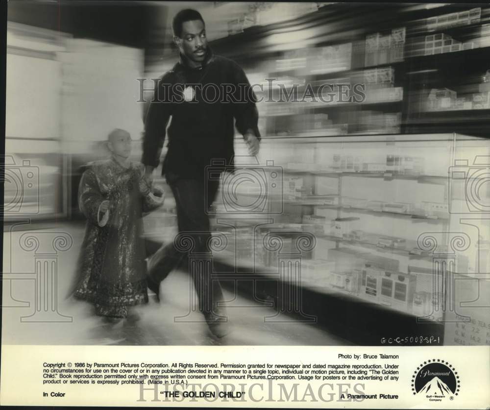 1986 Press Photo Actors Eddie Murphy, J.L. Reate in "The Golden Child" - Historic Images