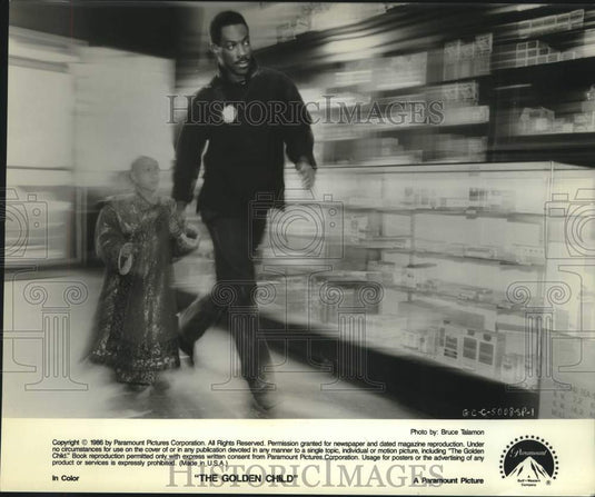 1986 Press Photo Actors Eddie Murphy, J.L. Reate in "The Golden Child" - Historic Images