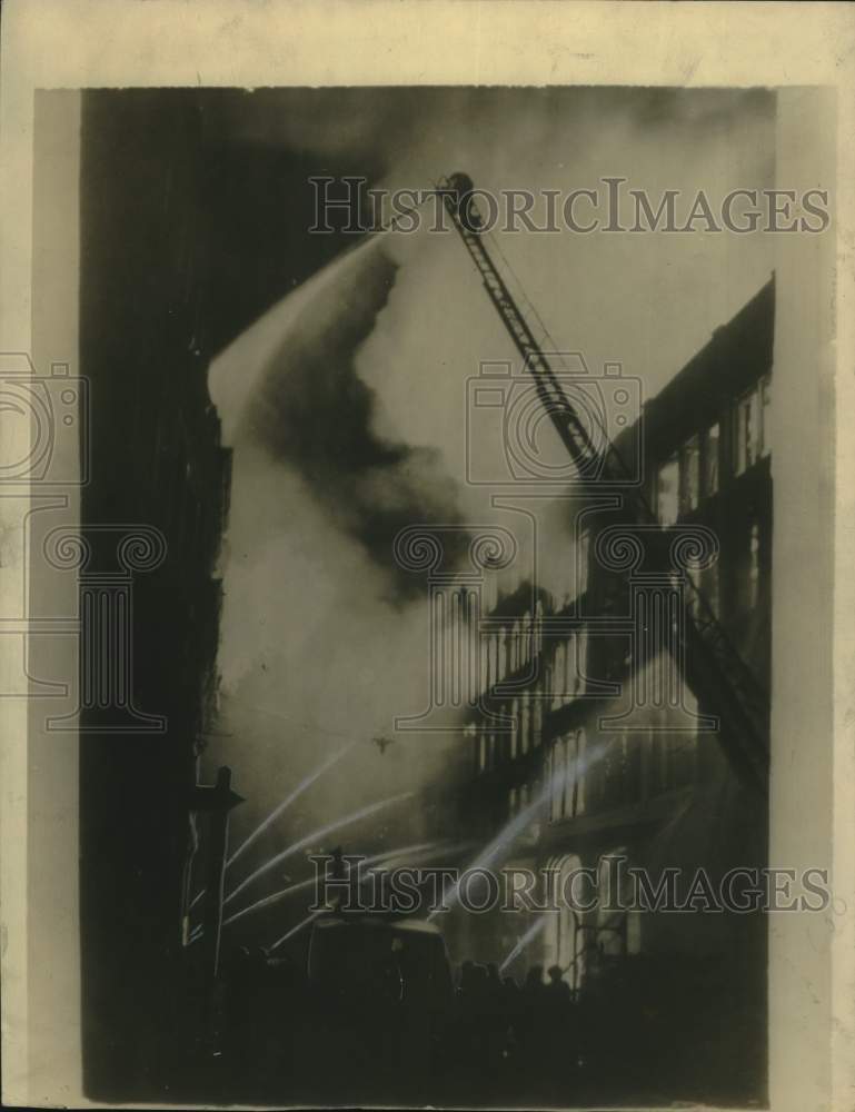 1940 Press Photo Firemen Fight London Blaze Caused by German Bombing Attack - Historic Images