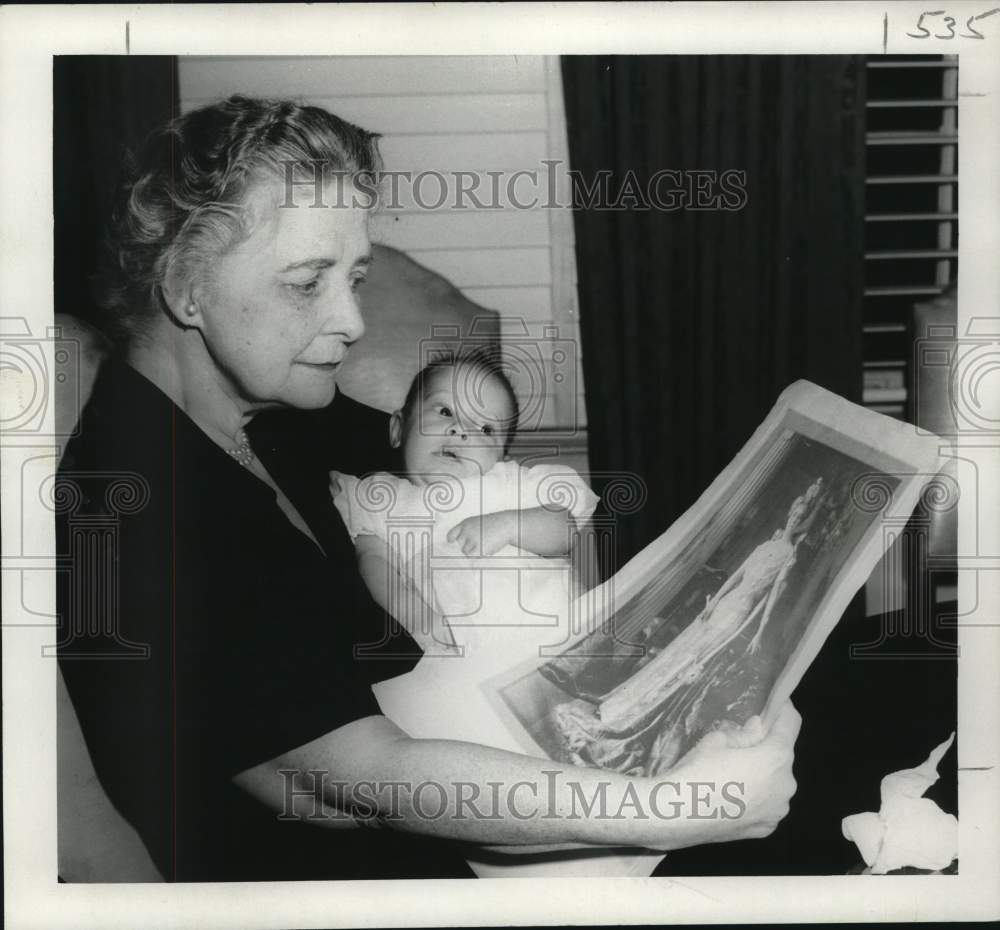 1958 Mrs. David Loker views a photo of the 1908 &quot;Queen of Carnival&quot;-Historic Images