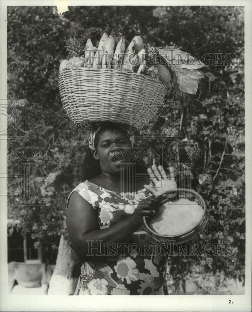1975 Jamaican Woman Sings, Plays Tambourine Historic Images