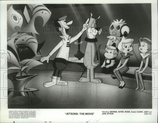 1990 Press Photo The cartoon cast of "Jetsons: The Movie" listen to George - Historic Images