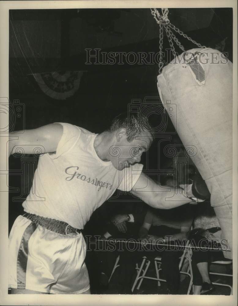 Heavyweight Boxer Ingemar Johansson at Punching Bag - Historic Images