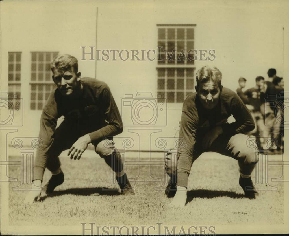 1967 Sam Love and Pierce Carey in a football pose. - Historic Images