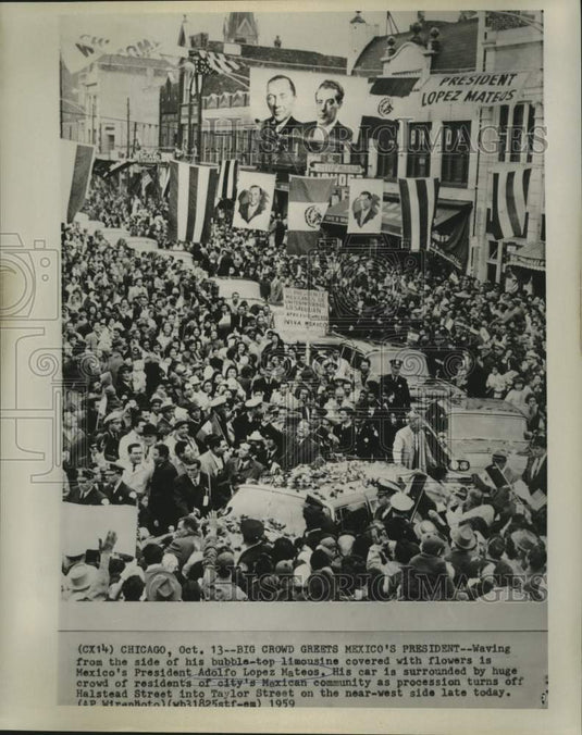 1959 Mexico's Pres. Adolfo Lopez Mateos waves to a crowd in Chicago-Historic Images