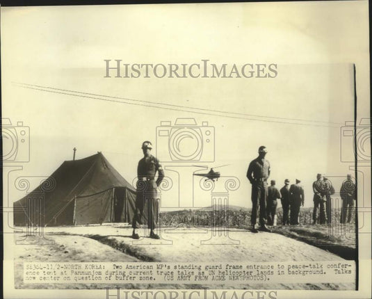 1951 Two MP's stand guard at the tent during peace-talks in Korea.-Historic Images