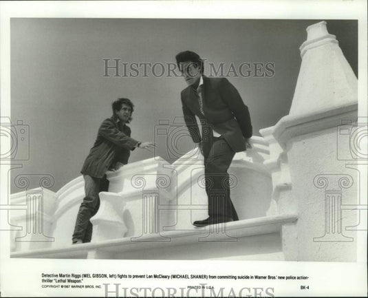 1987 Press Photo Mel Gibson and Michael Shaner in "Lethal Weapon." - Historic Images