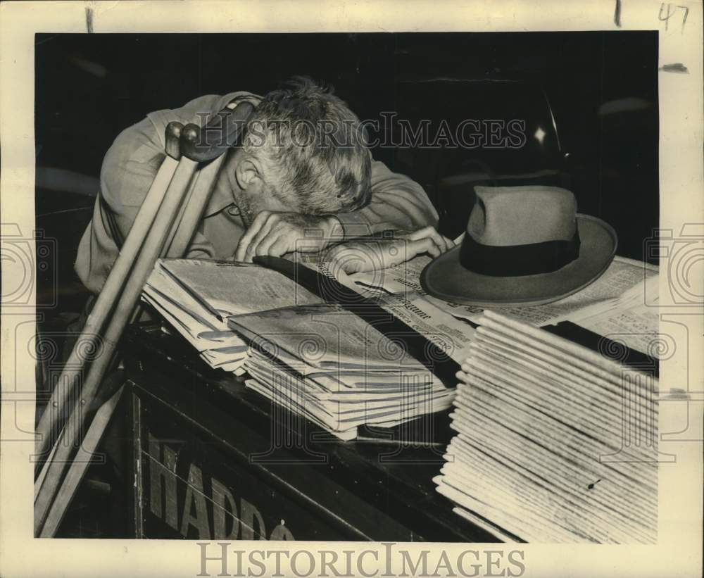 1948 Charlie Beck sells papers at Royal &amp; Canal Street. - Historic Images