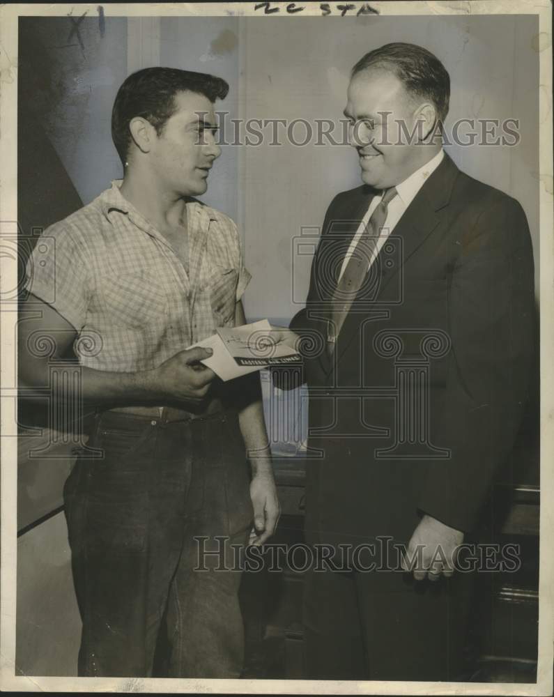 1954 Press Photo Irvin Naquin receives expenses for conference in Atlata.- Historic Images