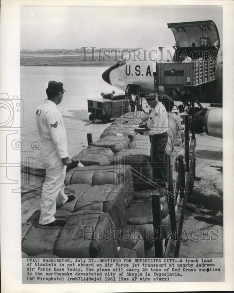 1963 A slew of blankets is loaded onto an Air Force jet, Washington-Historic Images