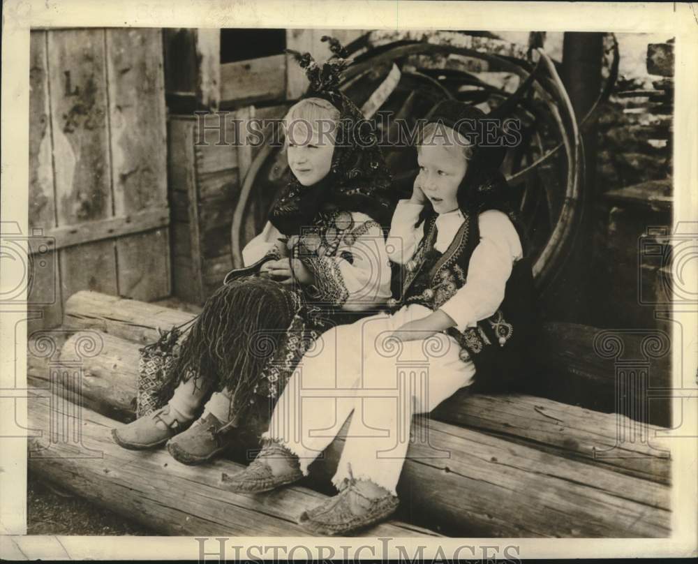 1941 Press Photo A Yugoslav Boy &amp; Girl sit all dressed up in national costume - Historic Images