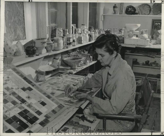 1956 Press Photo Mrs. Wolfe works on a mosaic tile art piece for her kitchen - Historic Images