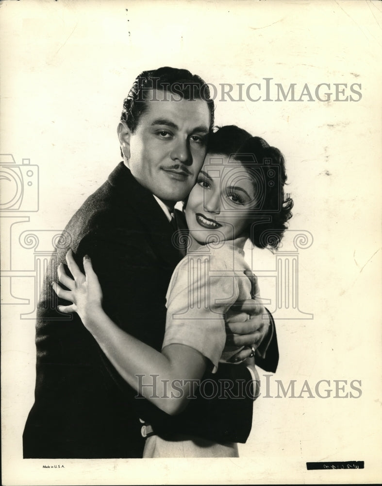 1938 Marjorie Weaver and Tony Martin star in Kentucky Moonshine - Historic Images