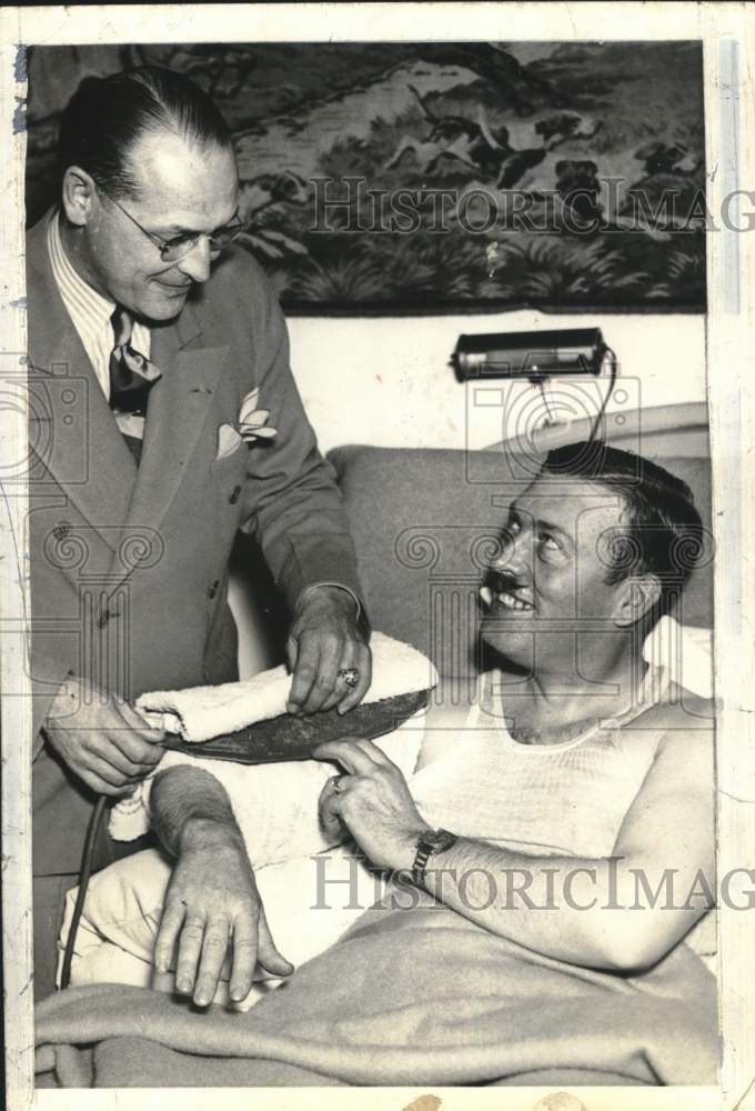 Press Photo Pilot Roscoe Turner examined by a doctor - pia02771- Historic Images