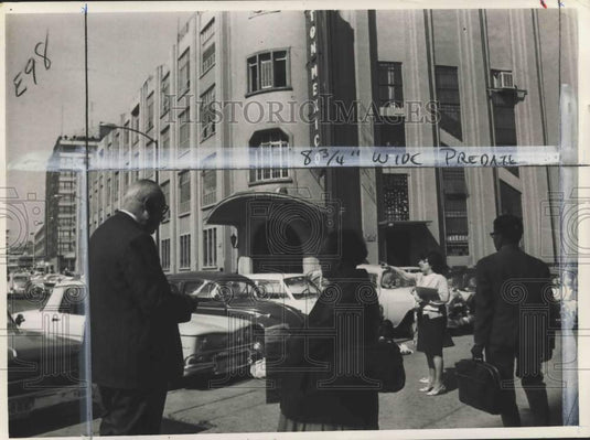 1969 Man with briefcase & others stand by parked cars in Mexico-Historic Images