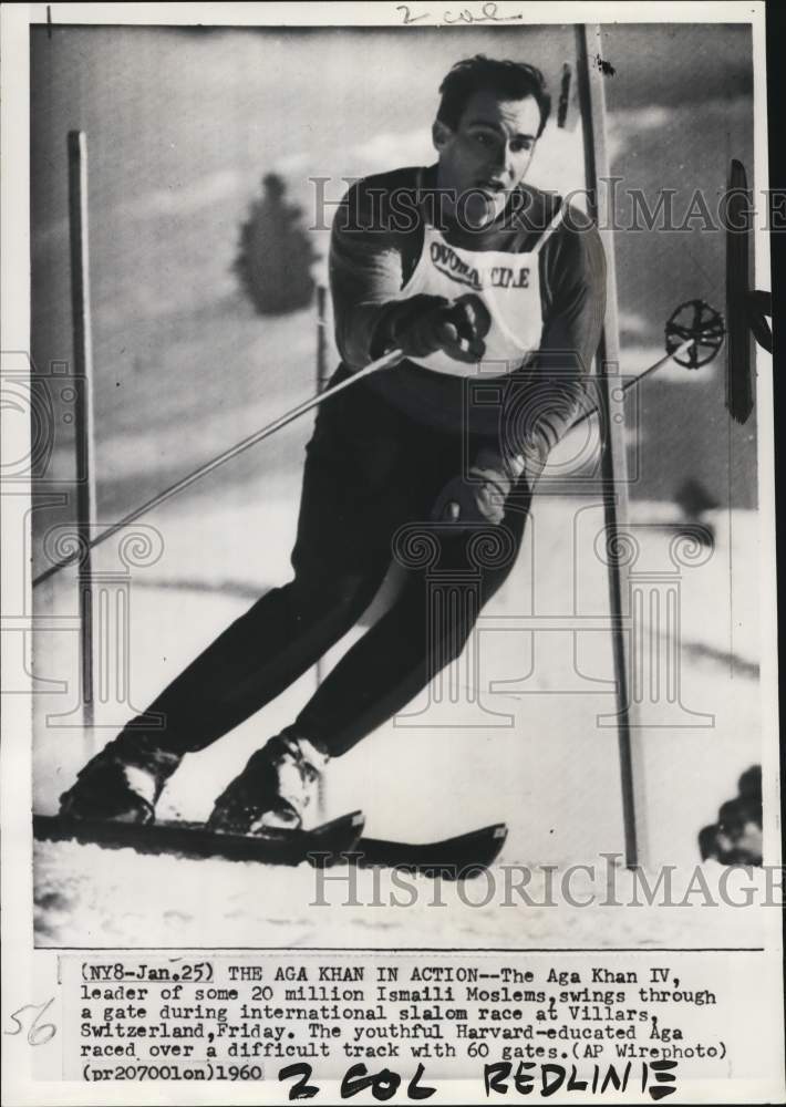 1960 Press Photo Aga Khan IV skis during international slalom race, Switzerland- Historic Images