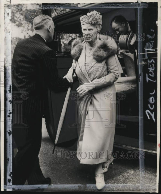 1951 Queen Mary assisted from royal service, England-Historic Images