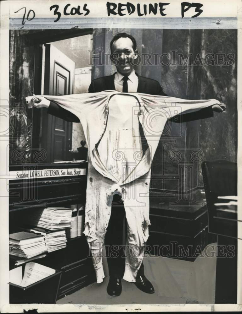 1965 Senator Lowell Peterson showing off worn long-underwear-Historic Images