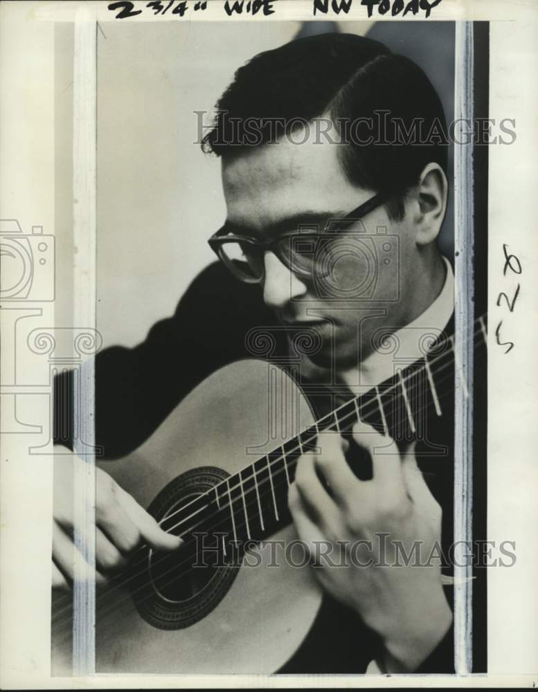 1967 Guitarist John Williams plays classical guitar-Historic Images