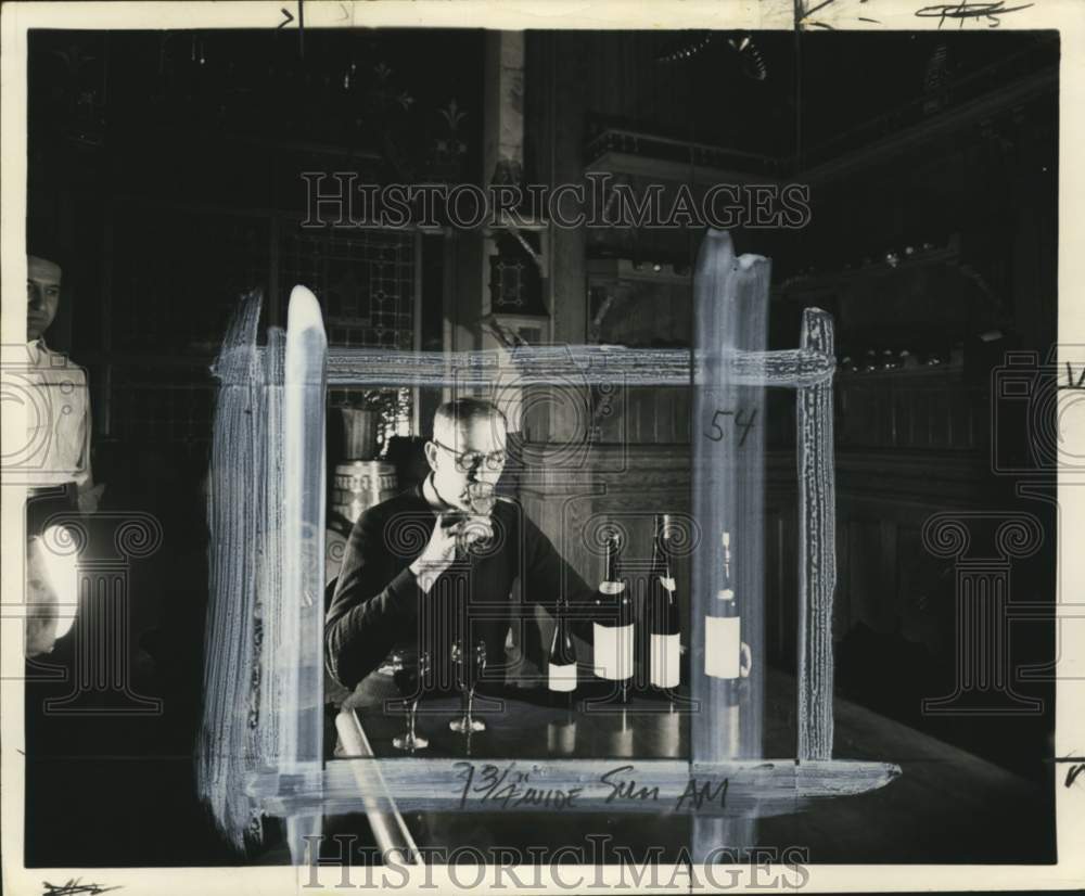 1961 Press Photo Man tasting several kinds of wine - pio07721- Historic Images