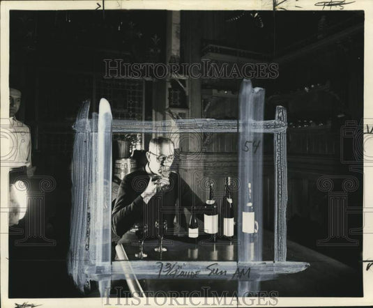 1961 Press Photo Man tasting several kinds of wine - pio07721- Historic Images