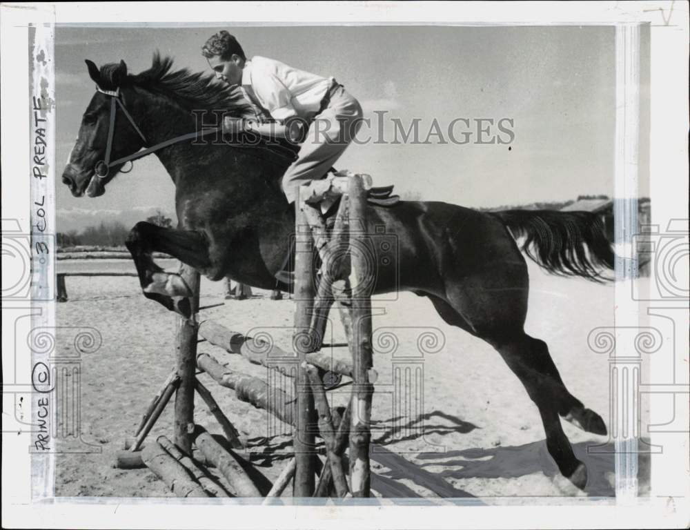 1955 Press Photo Prince Juan Carlos of Spain during a horse ride - pio37941- Historic Images