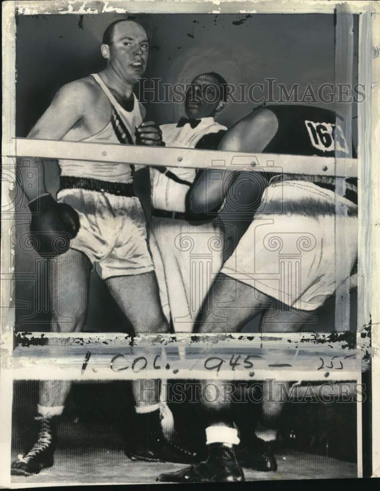 1956 Press Photo Boxers Pete Rademacher and Lev Meukhine during a bout- Historic Images