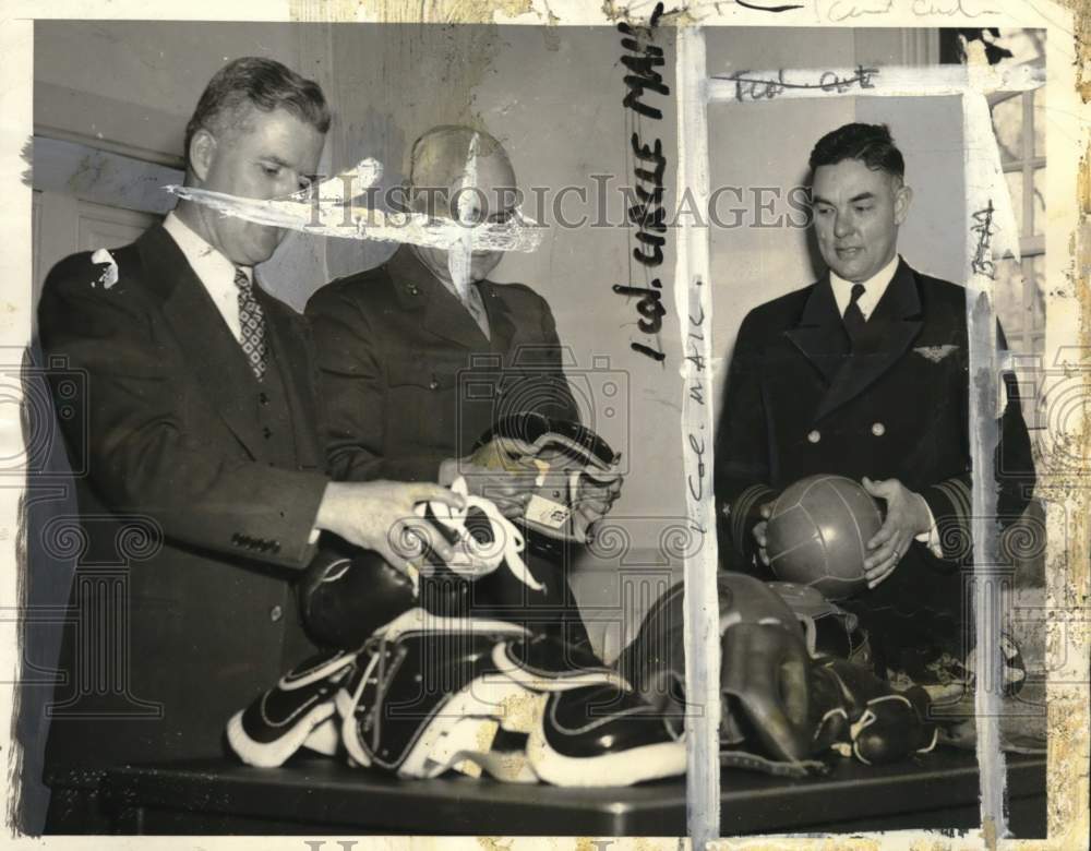 1942 Press Photo Naval Academy Sports Administrators Examine School Equipment- Historic Images