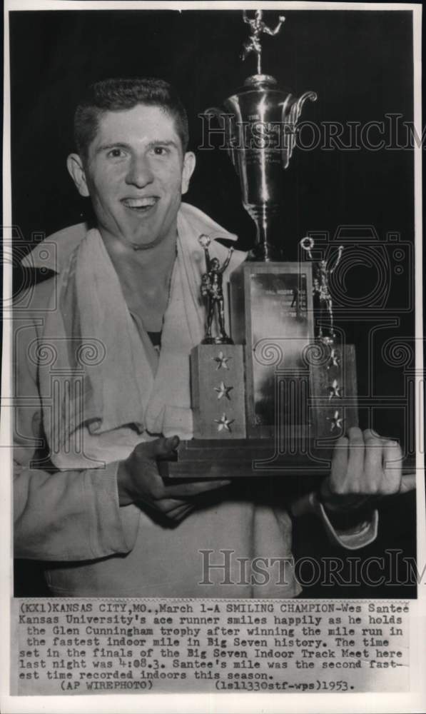 1953 Press Photo Wes Santee wins Glen Cunningham trophy, indoor track meet, MO- Historic Images