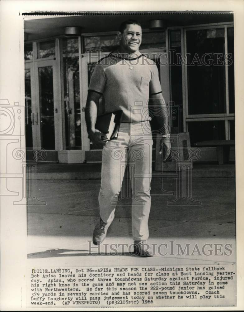 1966 Press Photo Michigan State&#39;s Bob Apisa leaves dormitory, East Lansing - Historic Images