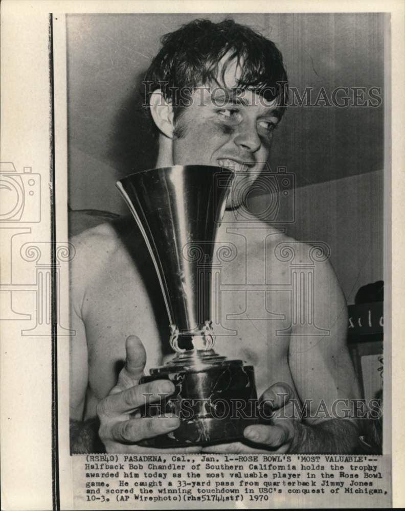 1970 Press Photo Bob Chandler holds Rose Bowl football MVP trophy, Pasadena, CA- Historic Images