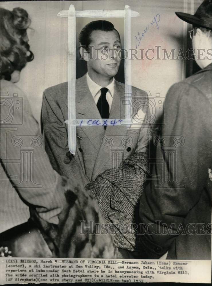 1950 Press Photo Ski teacher Hans Hauser & reporters, Ambassador East Hotel, IL - Historic Images