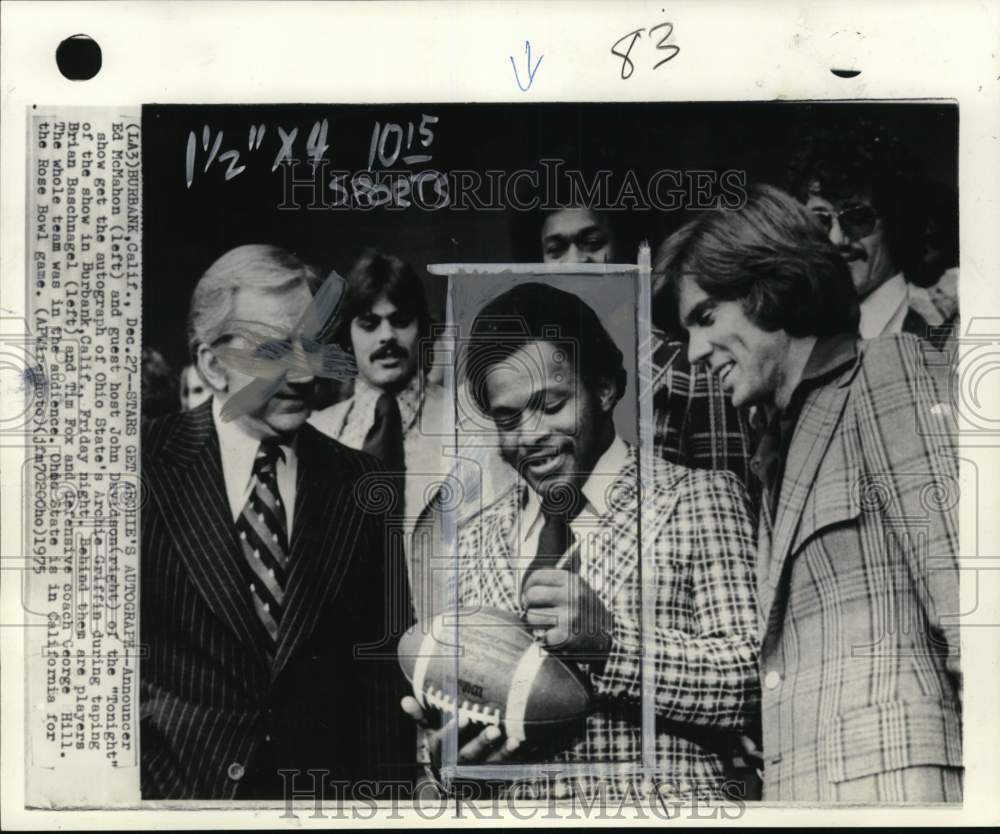 1975 Press Photo Ohio State&#39;s Archie Griffin signs football, Burbank, California- Historic Images