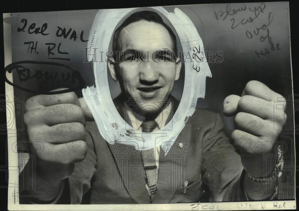 1957 Press Photo Middleweight boxing champion Gene Fullmer displays his fists - Historic Images