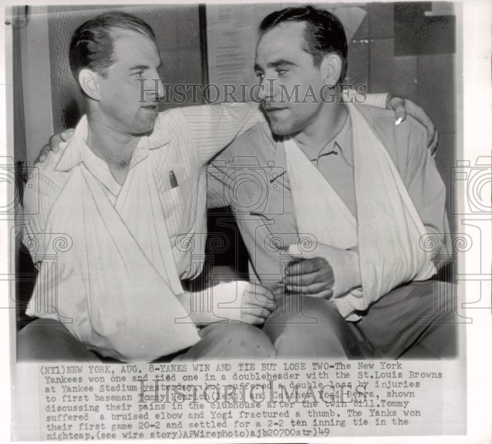 1949 Press Photo Tommy Henrich, Yogi Berra discuss baseball injuries in New York- Historic Images