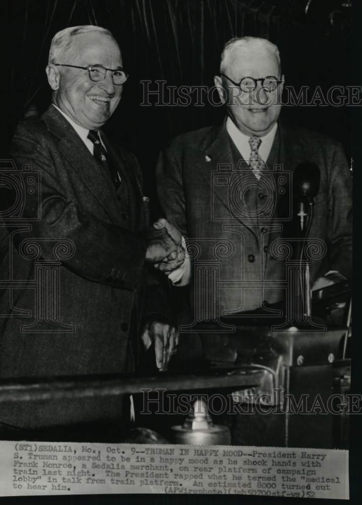 1952 U.S. President Harry S. Truman & Frank Monroe shake hands, MO-Historic Images