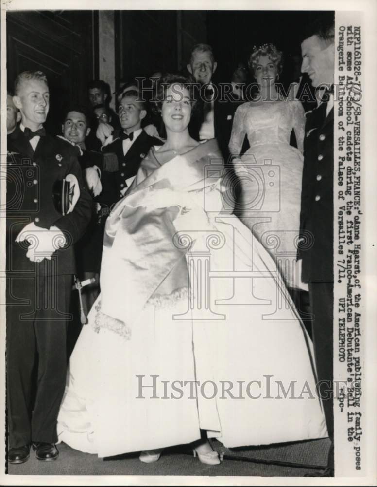 1958 JoAnne Hearst poses with Air-School cadets, Versailles, France - Historic Images