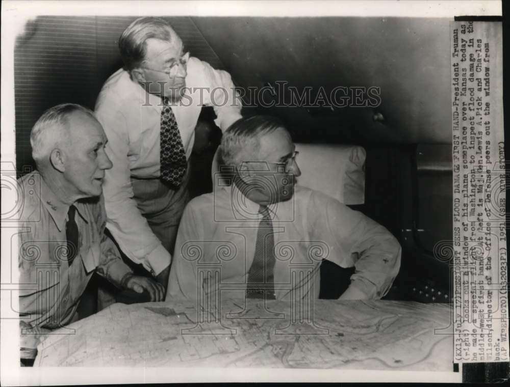 1951 President Harry S. Truman looks out plane window over Kansas-Historic Images